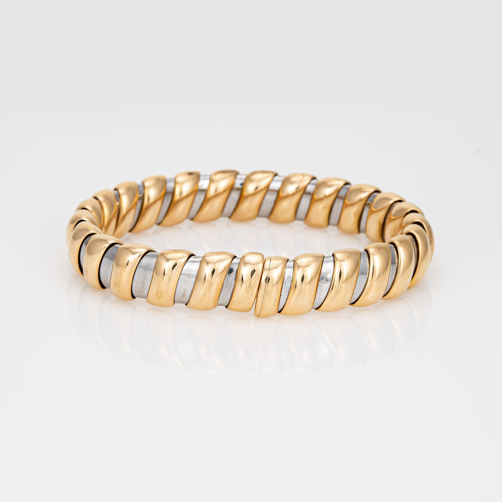 Stylish vintage Bulgari 'Tubogas' bracelet crafted in 18k yellow gold and stainless steel (circa 1980s).  

The bracelet is designed to resemble a flexible gas pipe, with braided gold an iconic Bulgari design. The Tubogas design requires a great