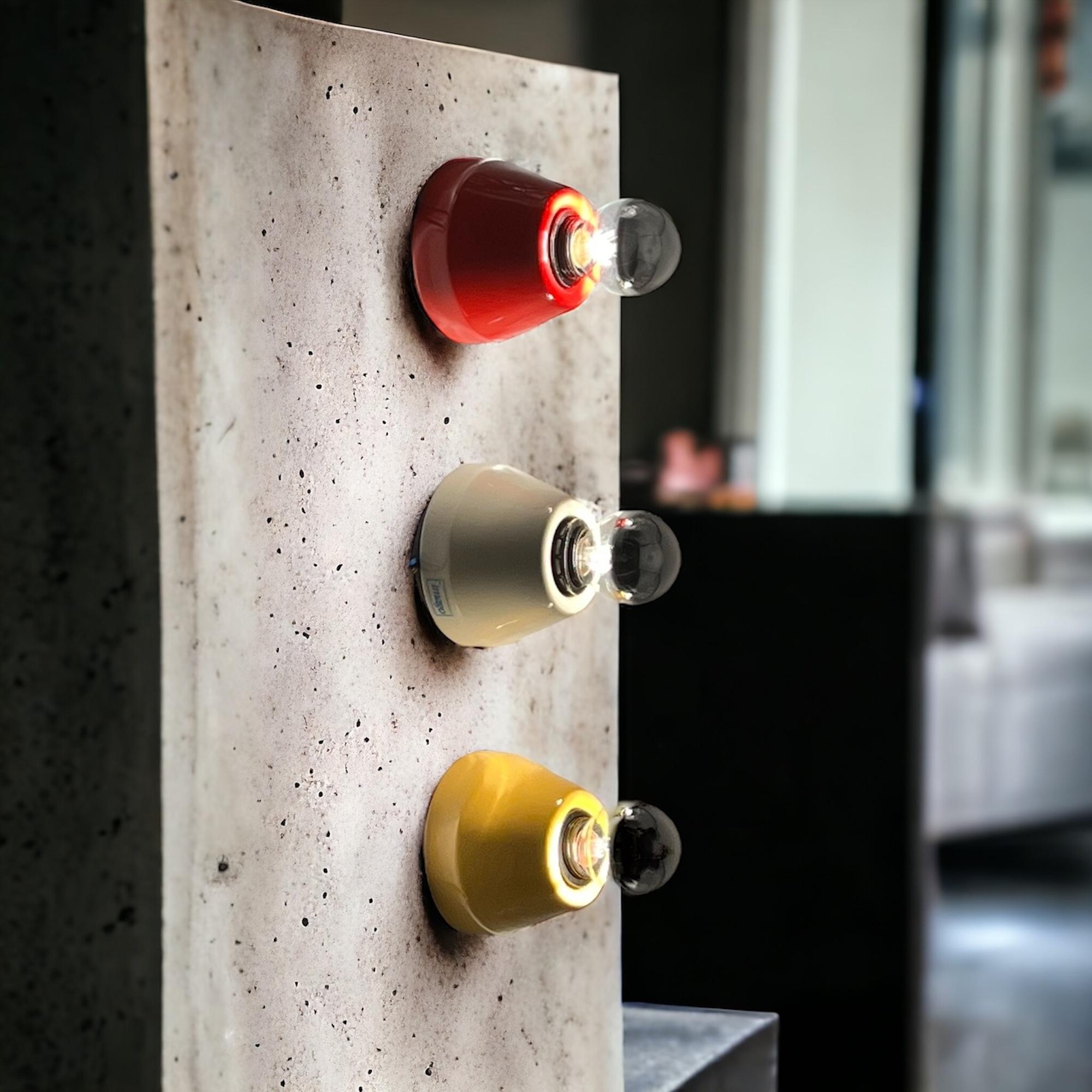 Step into the vibrant ambiance of the 80s Design Lamps with Imago Italy's exquisite ceramic flush mount lights. Crafted with a sleek and minimalistic design, these lamps are the epitome of retro chic elegance. Each lamp is adorned with vibrant hues