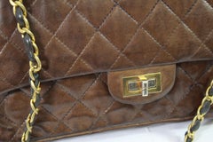 Vintage 80's Chanel 2.55 Bag in Brown Letaher and Golden Hardware. size 10"