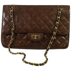 Vintage 80's Chanel 2.55 Bag in Brown Letaher and Golden Hardware. size 10"