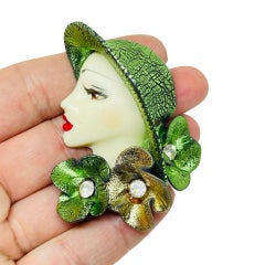 Spilla da donna vintage anni '80 in stile flapper art deco con volto da designer