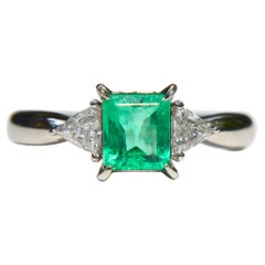 Vintage .88 Carat Emerald Trillion Cut Diamond Platinum Engagement Ring