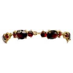 Vintage 8K Yellow Gold Bangle with 27 Deep Blue Garnets