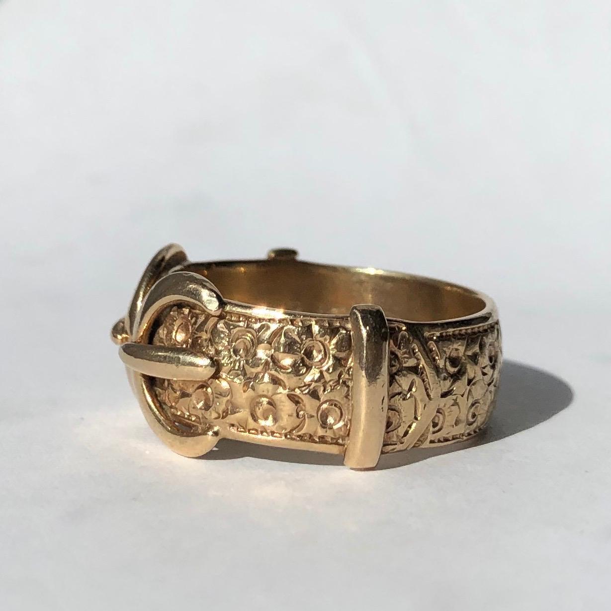 This gorgeous gold band was made in the 1940’s and is extra large and chunky! The double buckle detail is paired with fine engraving which is all around the band. Made in Birmingham, England. 

Ring Size: U 1/2 or 10 1/4
Band Width: 11mm

Weight: