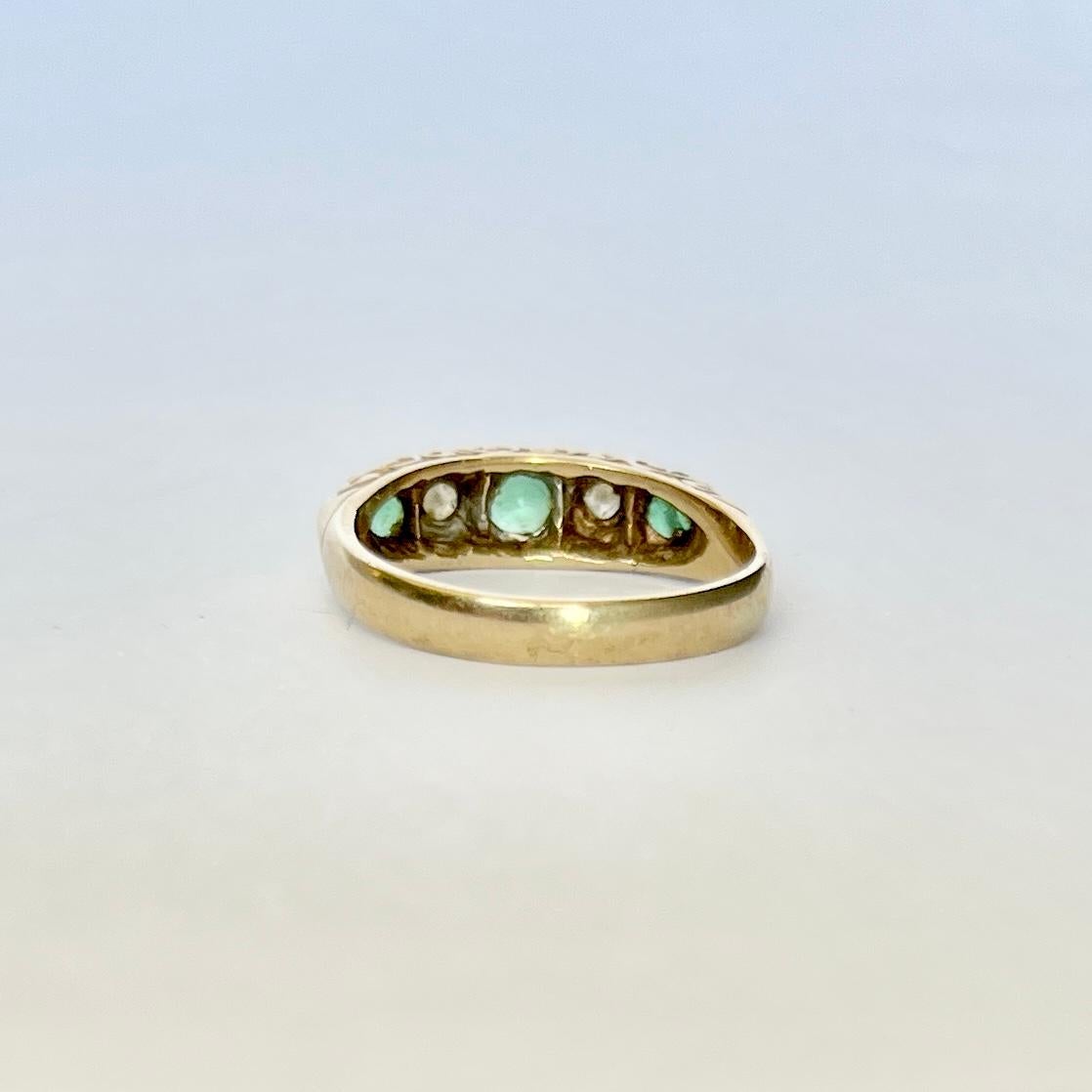 Vintage 9 Carat Gold Emerald and Diamond Five-Stone Ring In Good Condition For Sale In Chipping Campden, GB