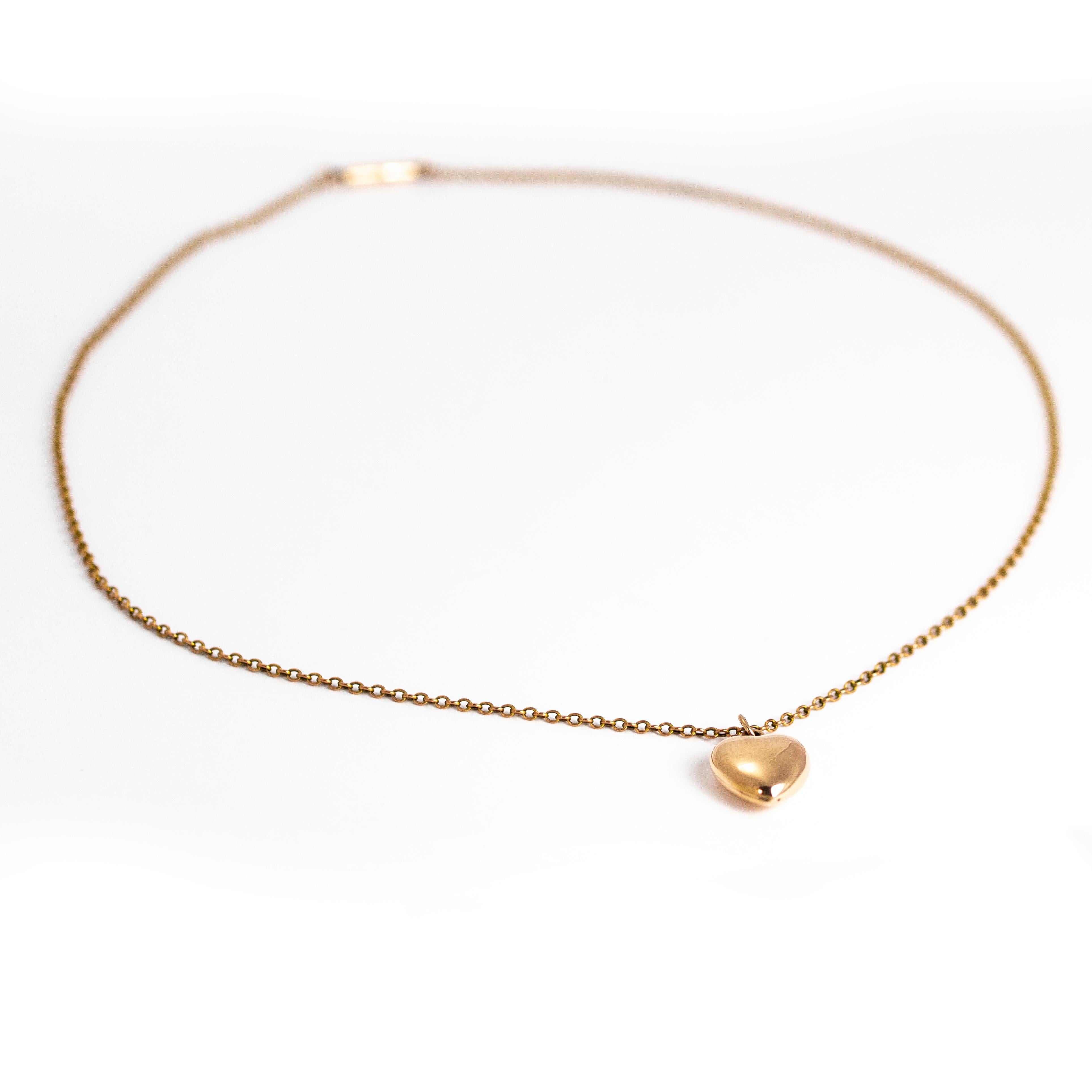 This glossy 9ct gold chunky heart is stunning and simple and also comes on a beautiful chain with a dainty barrel clasp. This heart and clasp are both hallmarked.

Length: 17 1/2 inches 