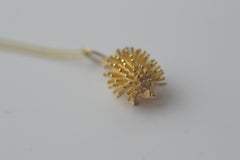 Vintage 9 carat gold hedgehog pendant on a 9 carat gold 18 inch chain