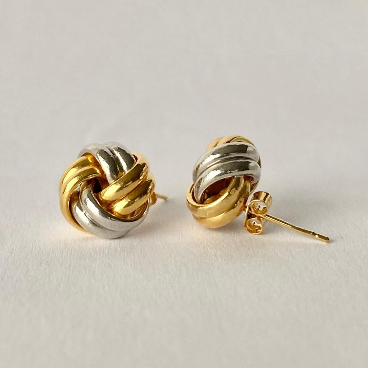 Glossy 9ct yellow and white gold superbly tied in a knot make the most stylish design for these earrings. 

Knot Diameter: 10mm
Height From Ear: 7mm

Weight: 0.93g
