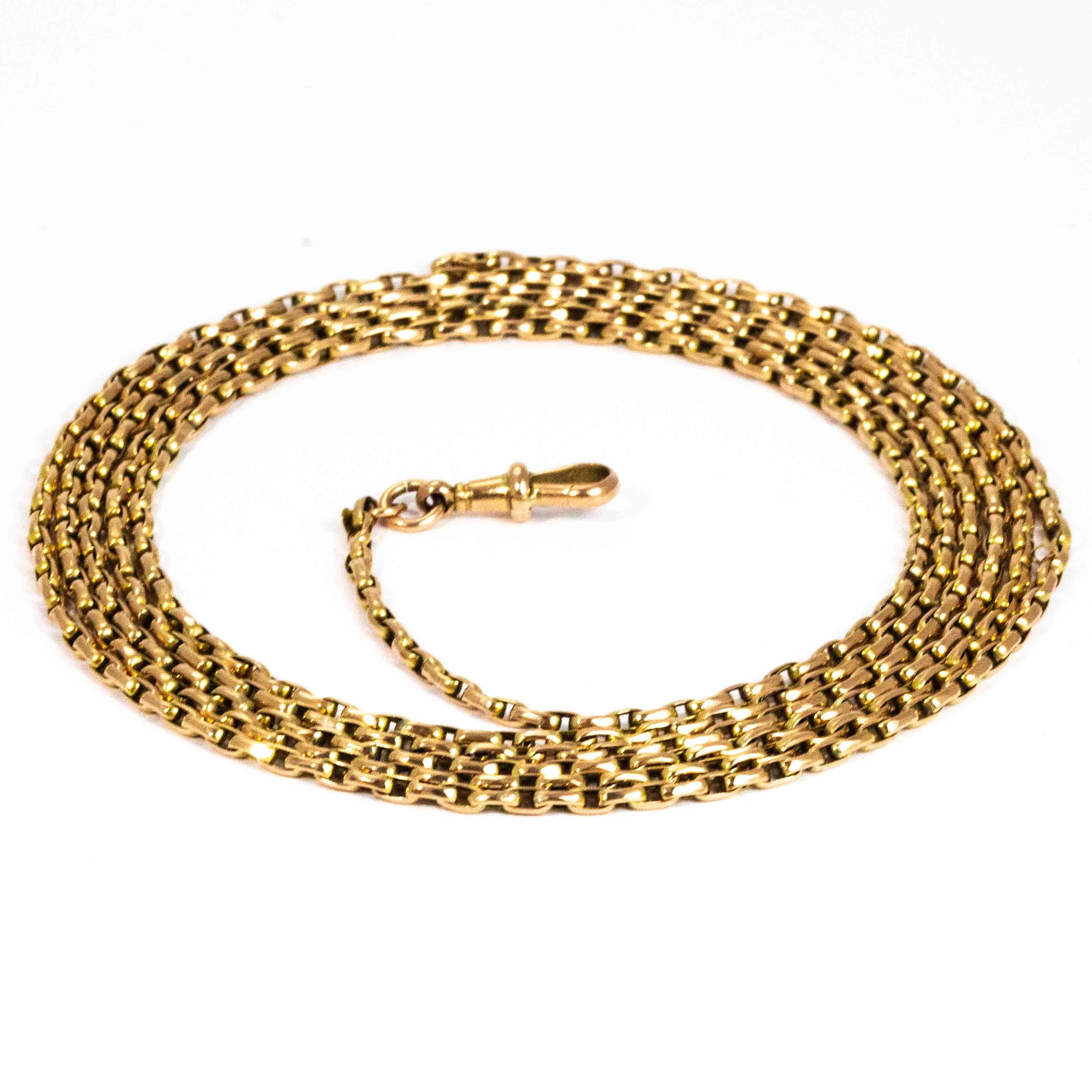 A beautiful vintage longuard chain necklace. The chain is formed of superb long slender links and finished in a fine dog-clip. Modelled in 9 carat yellow gold.

Length: 143cm