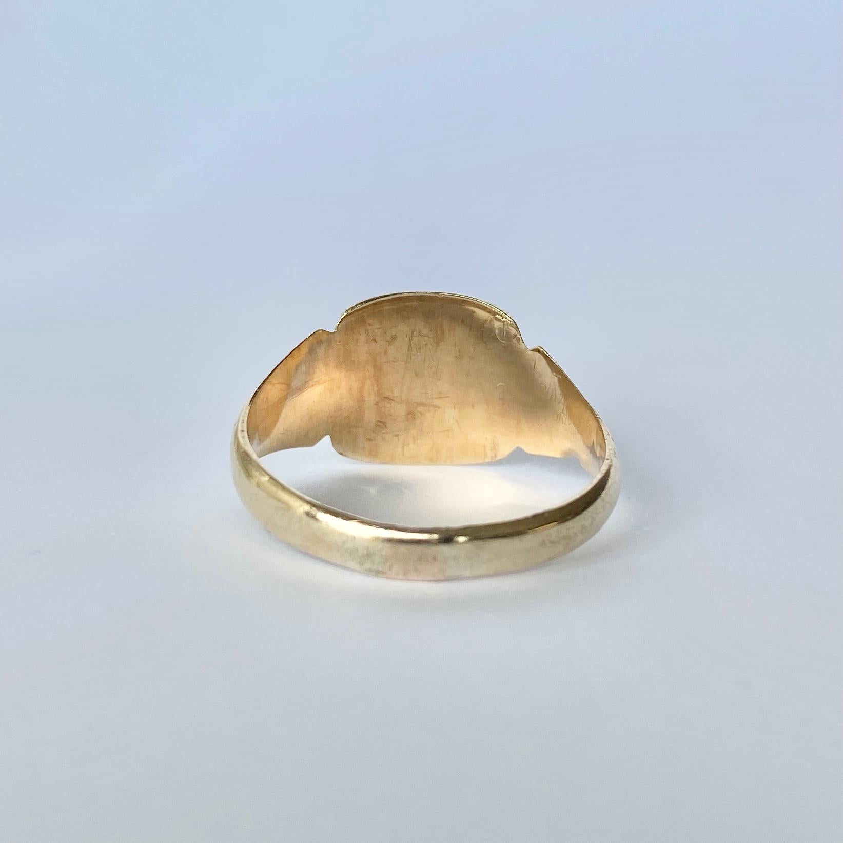This sweet signet is modelled in 9ct gold and has a face with the initials 'ALC' engraved into it. Fully hallmarked Birmingham 1957.

Ring Size: W or 11
Face Dimensions: 13x12mm 

Weight: 3.3g