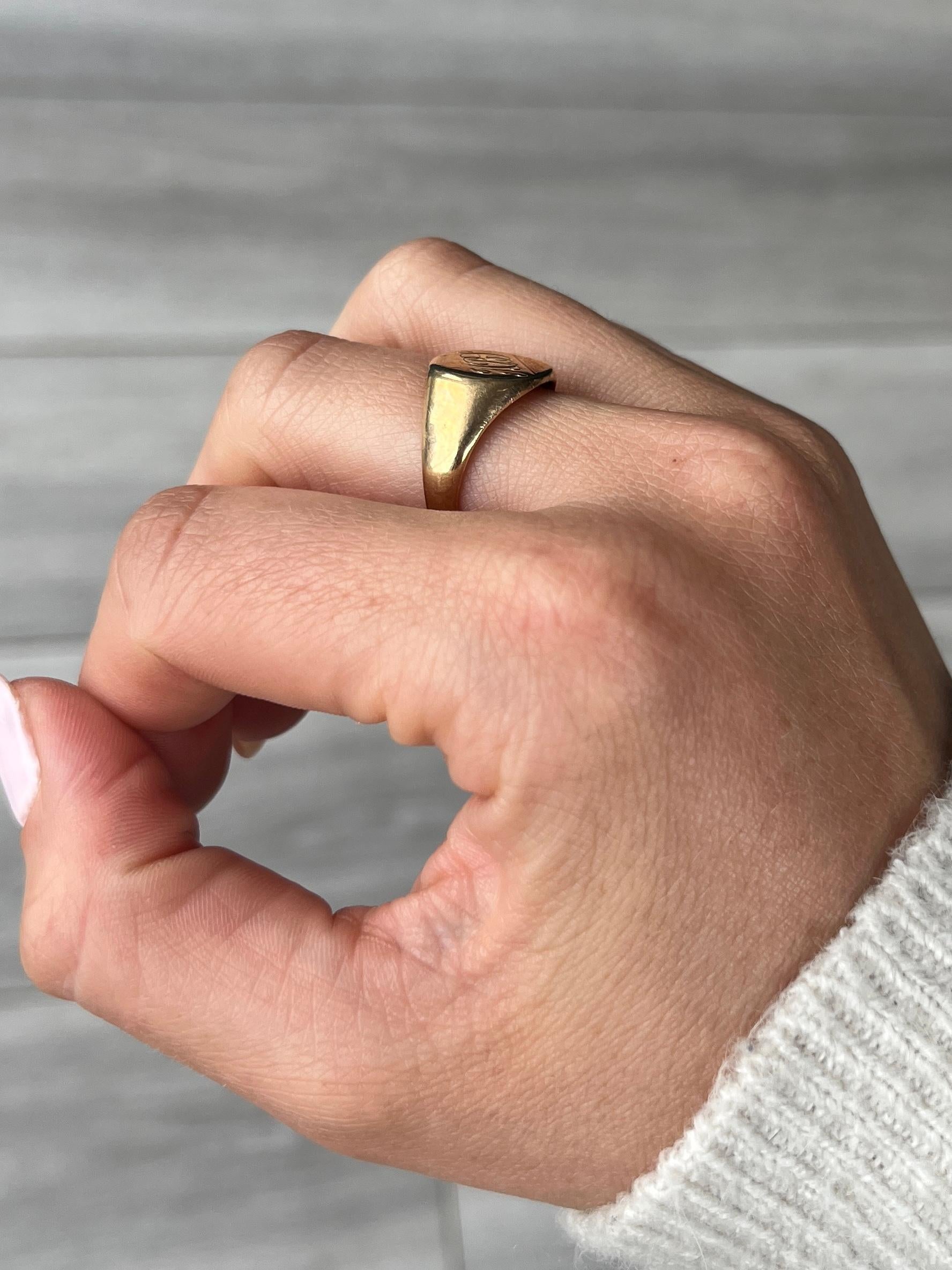 This signet is modelled in 9ct gold. The colour of the ring is bright yellow gold. Initials 'ABS' engraved onto the face. Fully hallmarked Birmingham 1954.

Ring Size: O or 7 1/4
Face Diameter: 12x12mm 

Weight: 4.6g