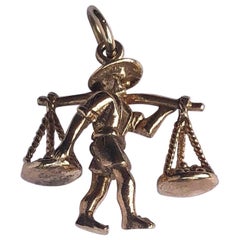 Vintage 9 Carat Man and Scales Charm Pendant