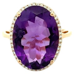 Vintage 9 Carat Oval Amethyst and RBC Diamond Gold Halo Solitaire Cocktail Ring