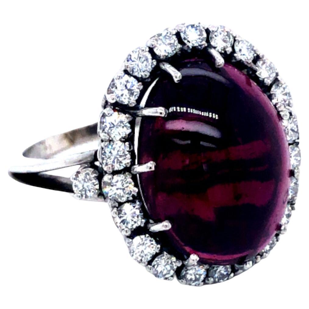 Vintage 18 Kt Gold Round Halo Diamond 9 Carat Red Cabochon Garnet Cocktail Ring For Sale