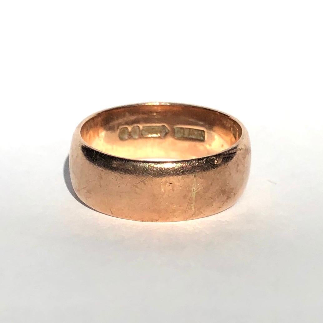 Simple gold bands make the classic wedding band or can be worn as a stylish everyday wear ring to stack or wear alone. Modelled in 9ct Rose Gold and made in London, England. 

Ring Size: O or 7 1/2
Band Width: 7.25mm 

Weight: 5.73g