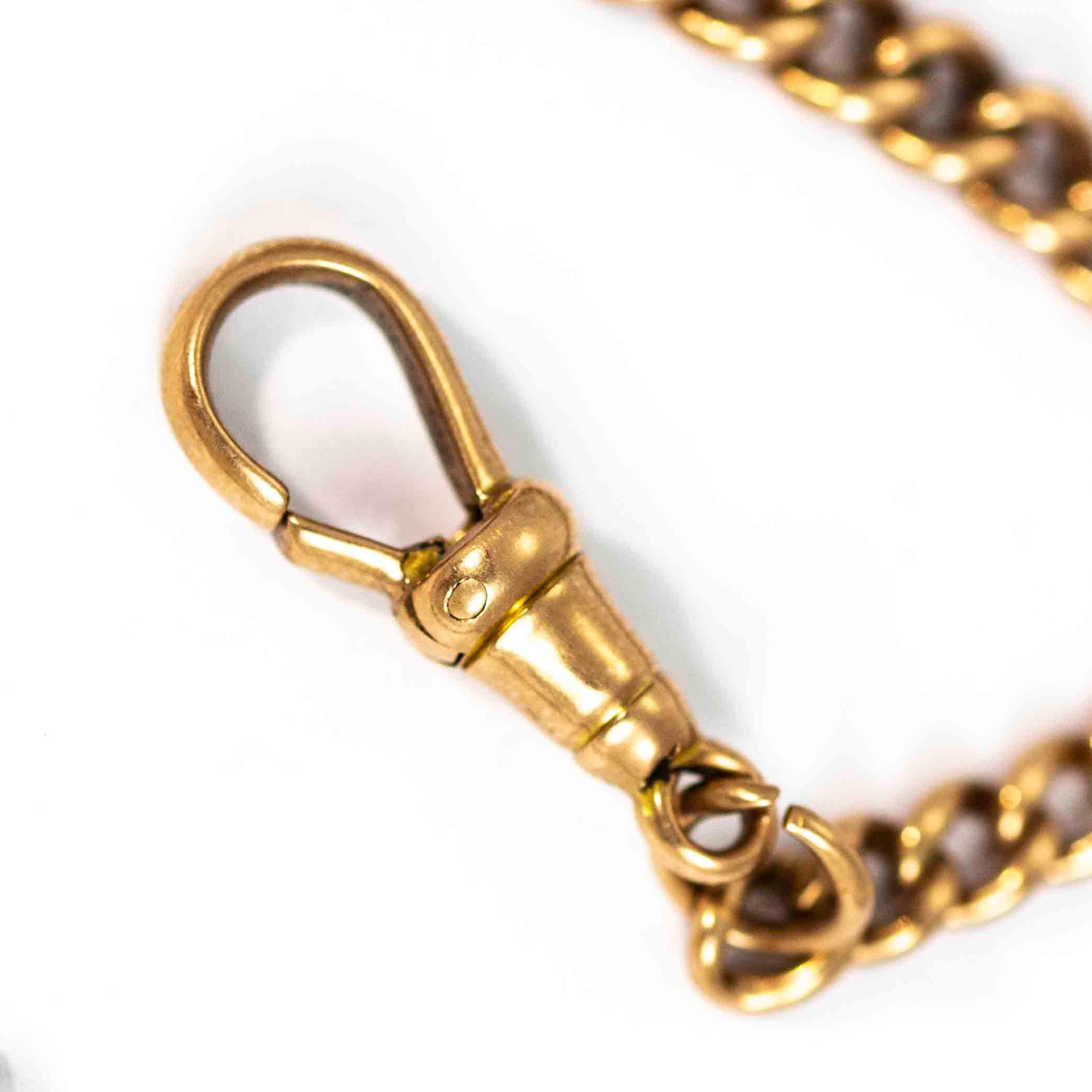 A fine vintage double Albert chain joined with a drop link and ended with a pair of superb dog-clips. Modelled in 9 carat rose gold.

Length: 40cm