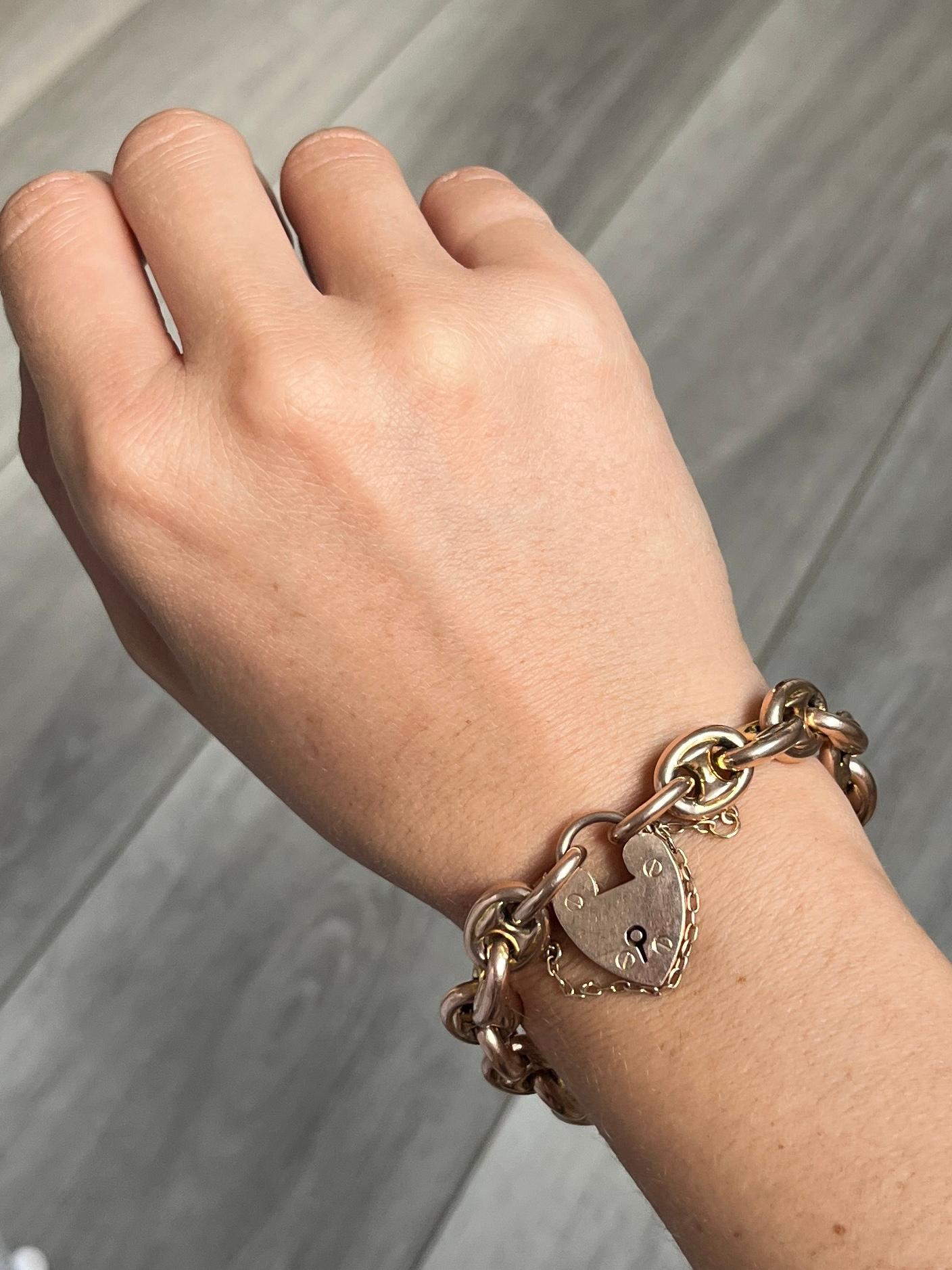 This bracelet is modelled in hollow 9ct rose gold, which makes the bracelet light weight and comfortable to wear. The link is a mariner link and the bracelet is fastened using a heart padlock.

Length: 19.5cm
Width: 11mm

Weight: 23.6g
