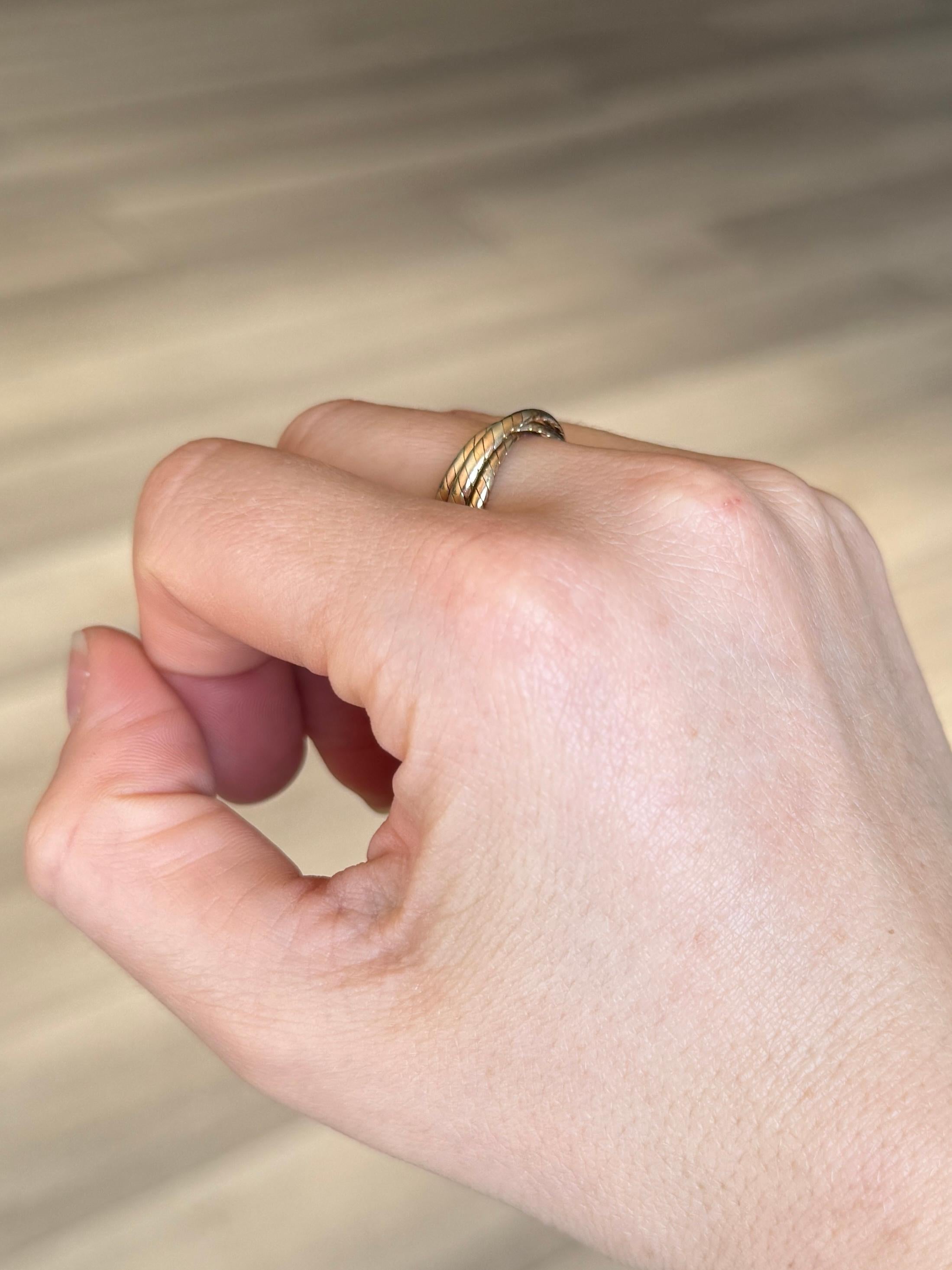 This yellow gold ring is modelled out of 9 Carat gold. Fully hallmarked Sheffield 1985.

Ring Size: M 1/2 or 6 1/2 
Band Widths: 2mm

Weight: 2.9g 