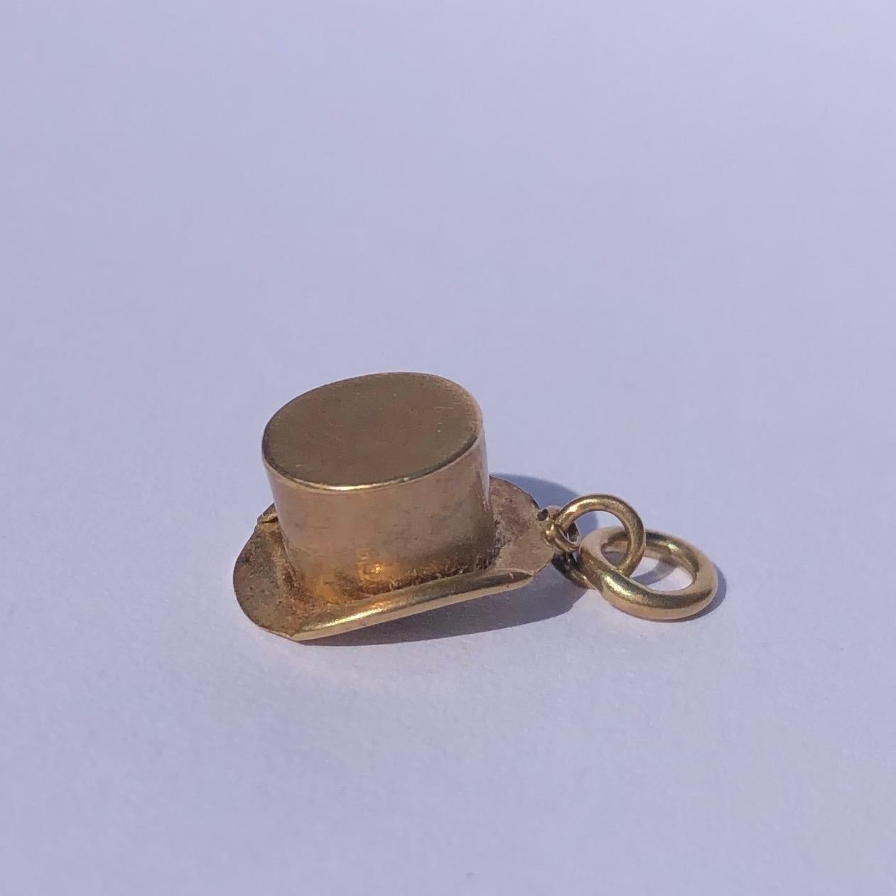 This is the sweetest little charm! It is a glossy gold top hat. The charm is modelled in 9ct gold. 

Hat Dimensions: 17x7.5mm 

Weight: 0.89g