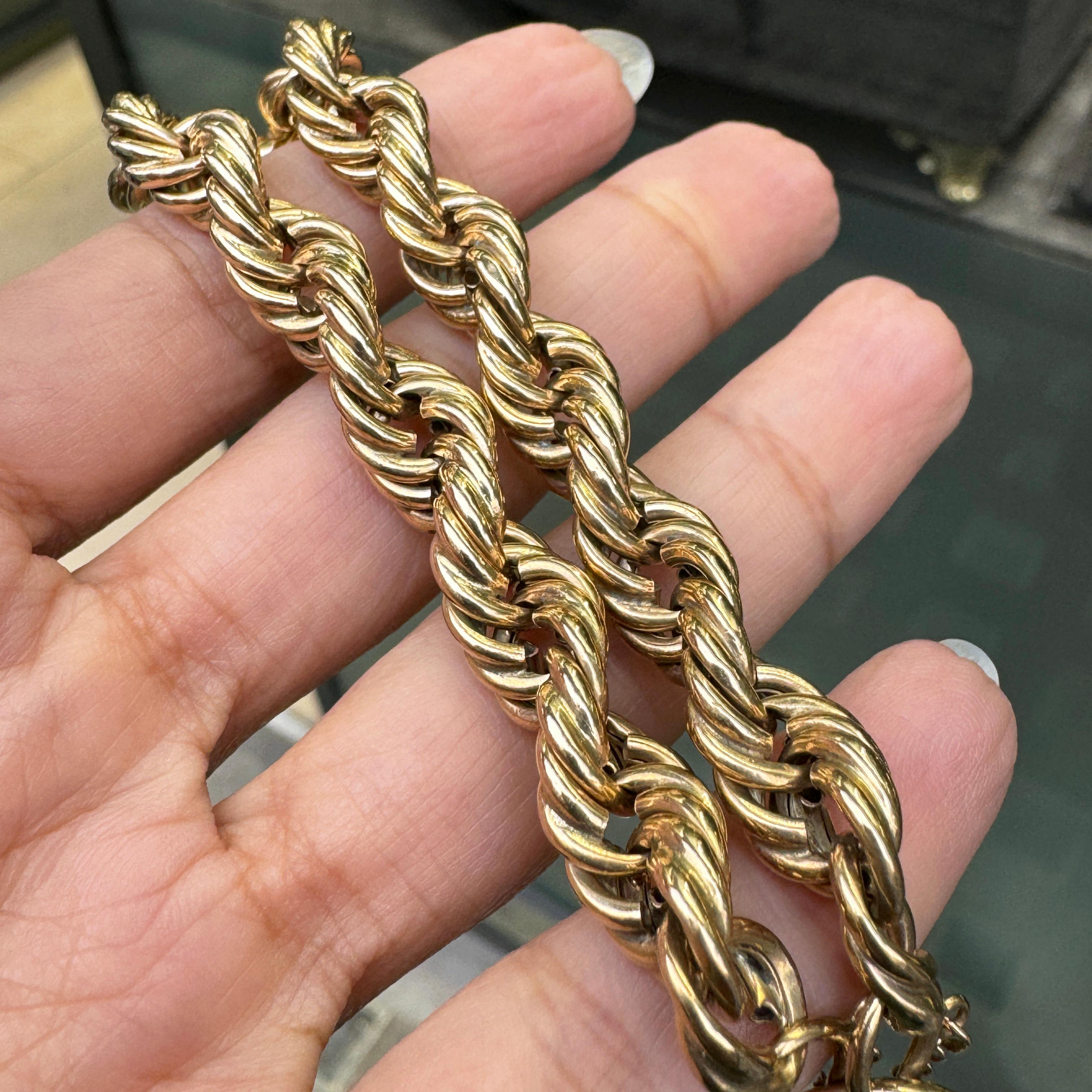 Bracciale d'epoca in oro giallo 9 carati a maglie intrecciate con lucchetto a cuore, 1977 In condizioni buone in vendita a London, GB