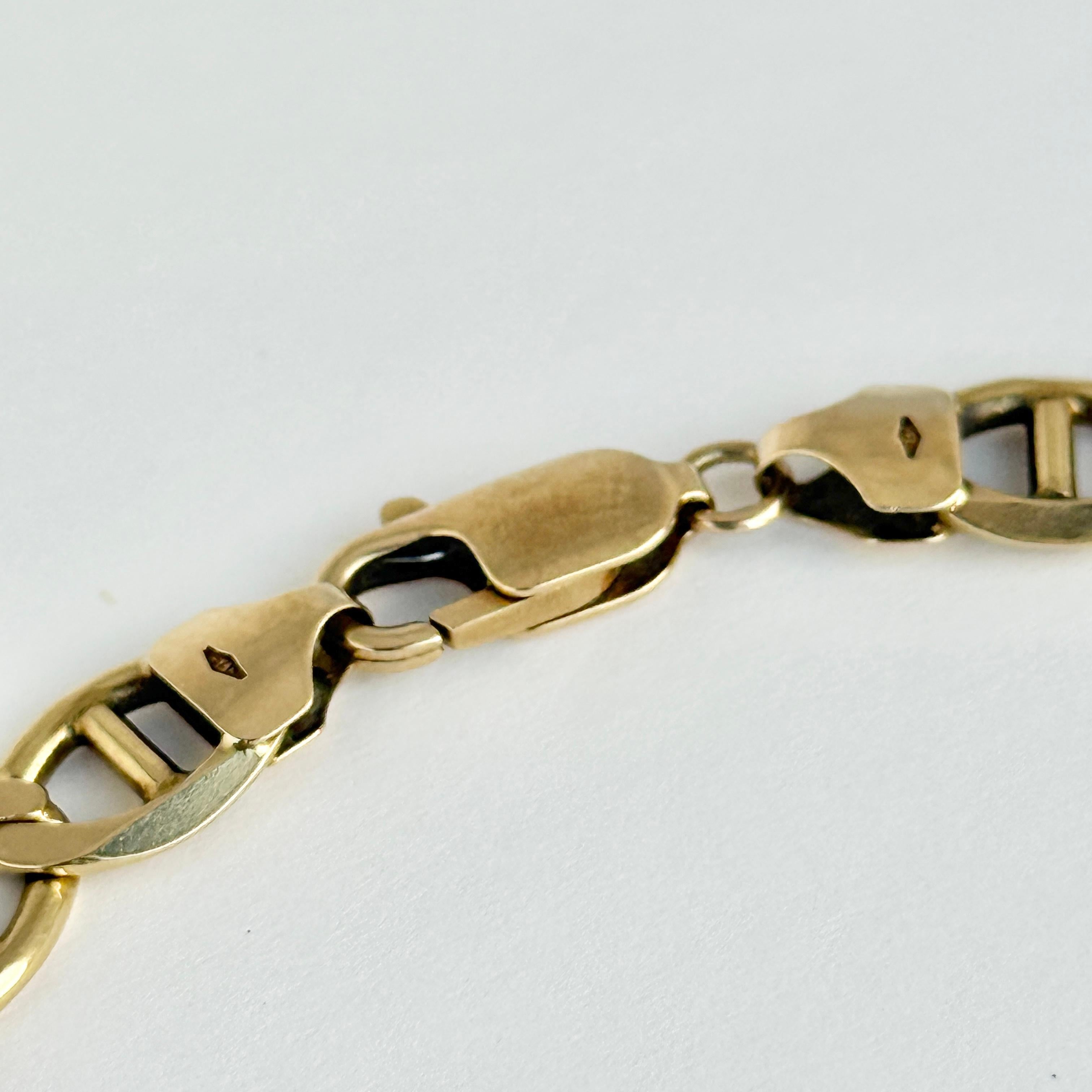 This bracelet is made in glossy 9 carat yellow gold. 

Length: 19.5cm
Width: 9mm

Weight: 14.97g

