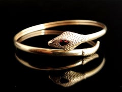 Vintage 9 Karat Yellow Gold Snake Bangle, Garnet