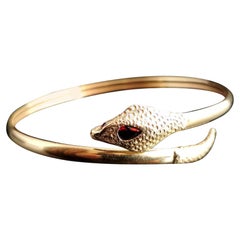 Vintage 9 Karat Yellow Gold Snake Bangle, Garnet