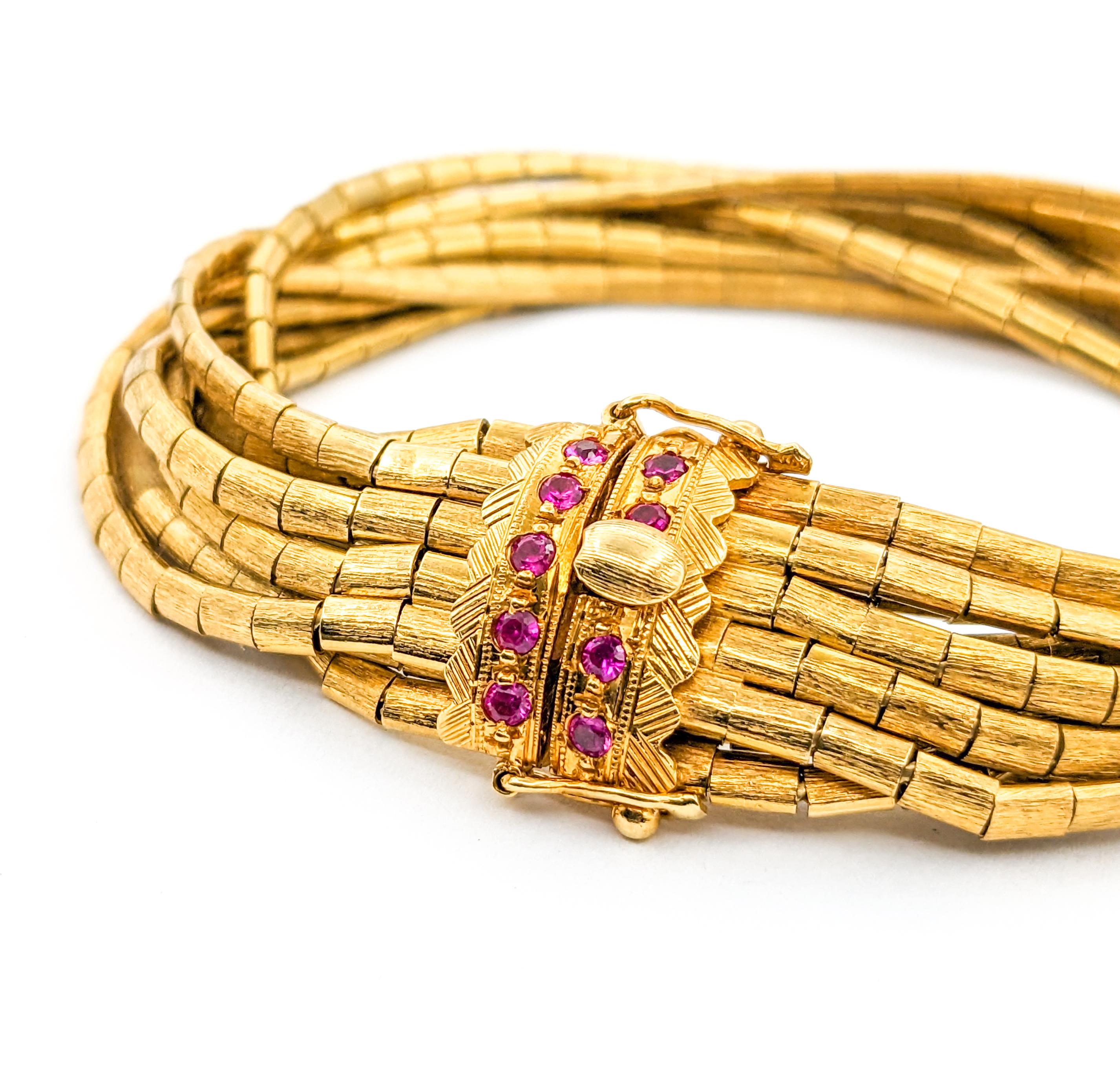 Round Cut Vintage 9-Strand Ruby Bracelet In Yellow Gold For Sale