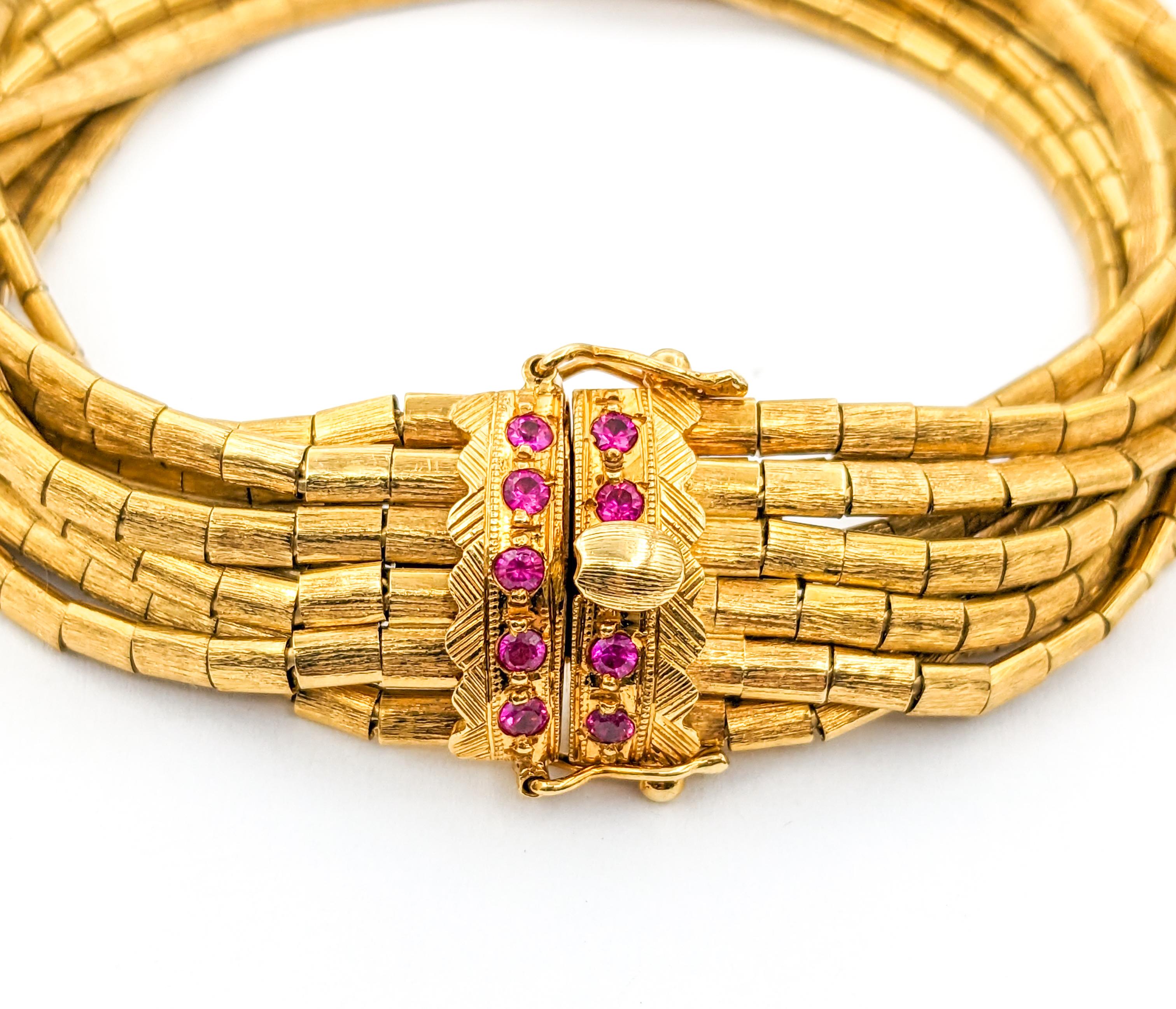 Vintage 9-Strand Ruby Bracelet In Yellow Gold In Excellent Condition For Sale In Bloomington, MN