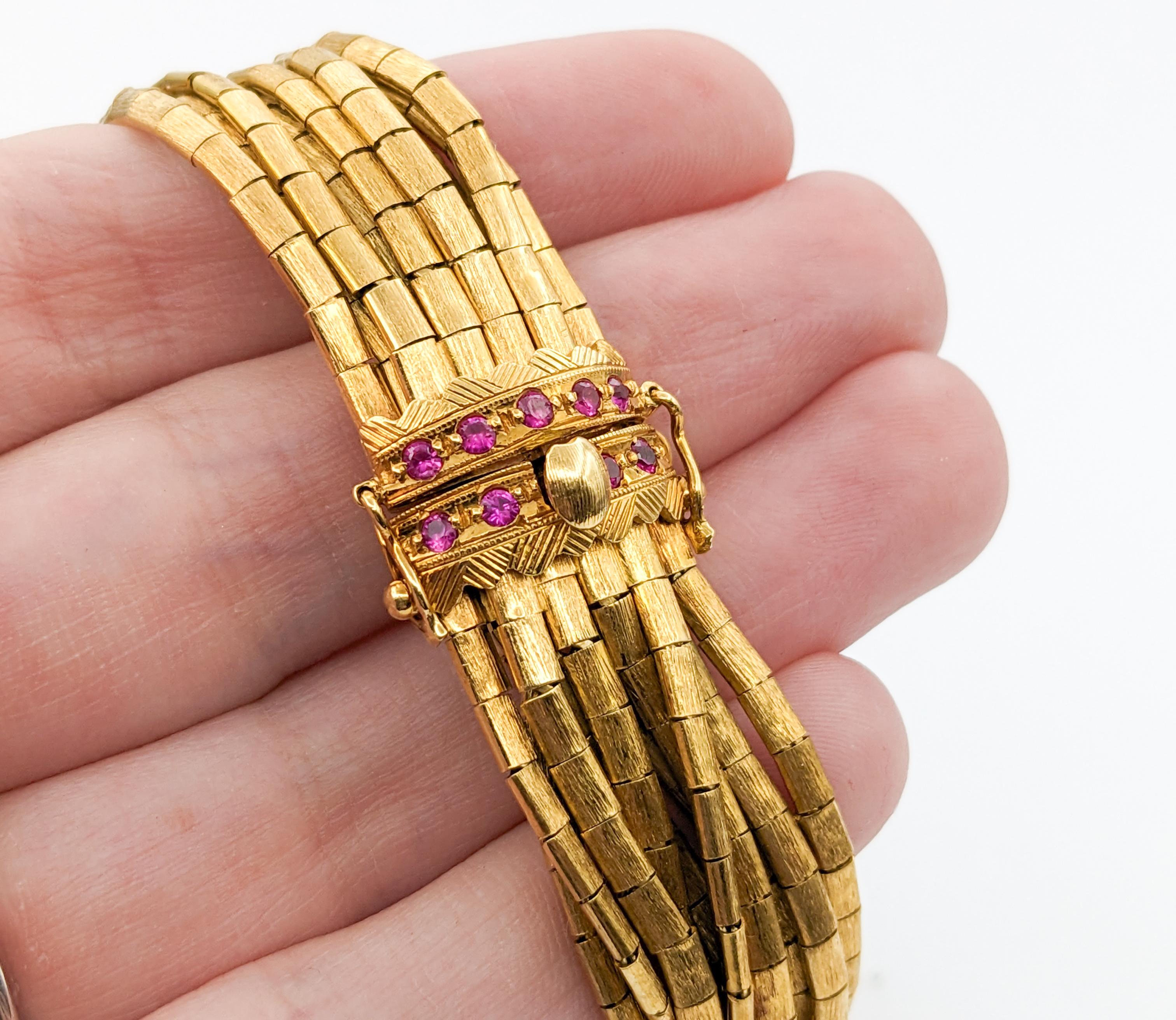 Vintage 9-Strand Ruby Bracelet In Yellow Gold For Sale 1