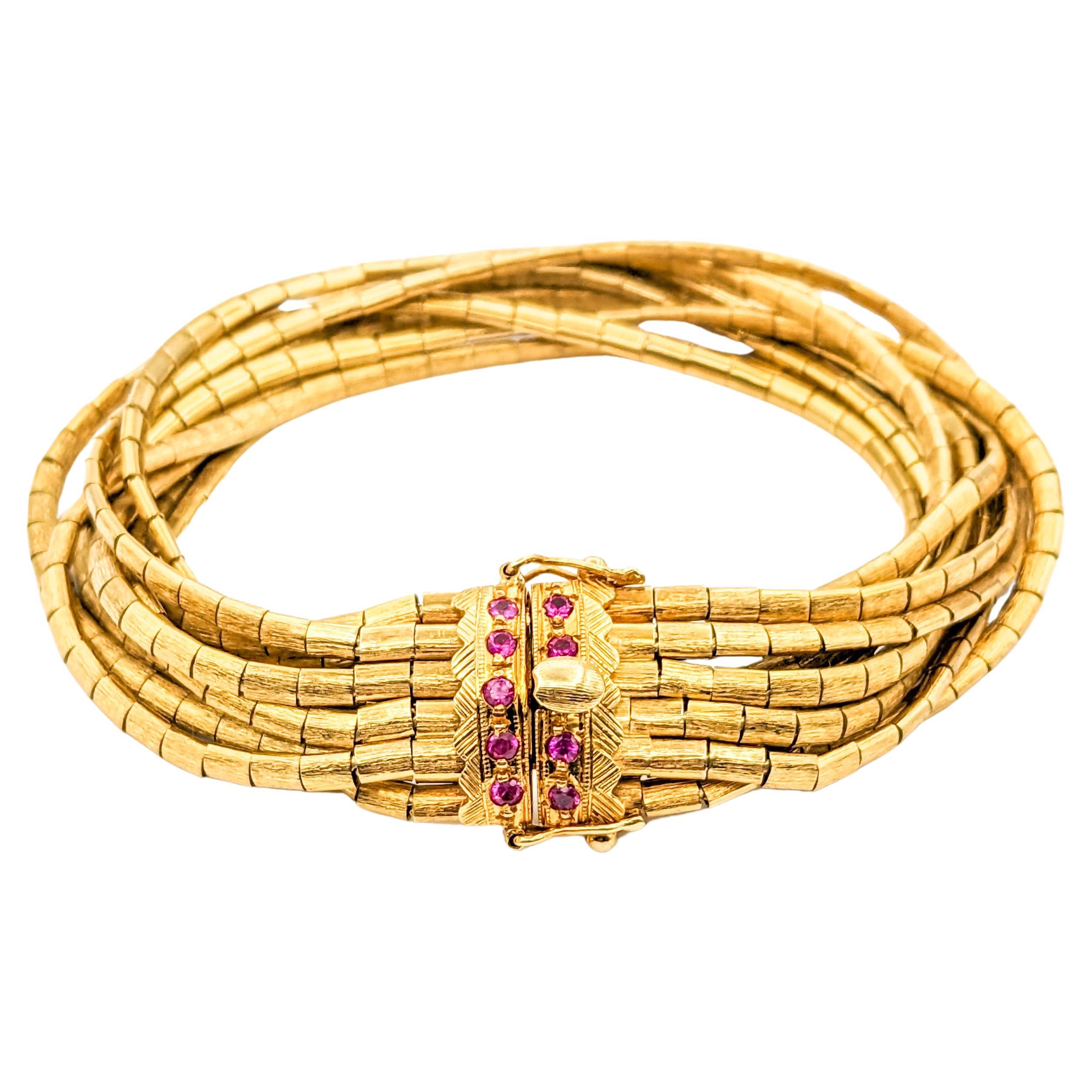 Vintage 9-Strand Ruby Bracelet In Yellow Gold For Sale