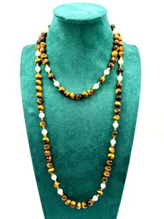 Vintage-Halskette, 90 cm lang, aus durchgehenden Perlen aus Tigerauge, Perle und Gold