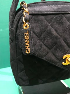 Chanel black quilted suede handle handbag