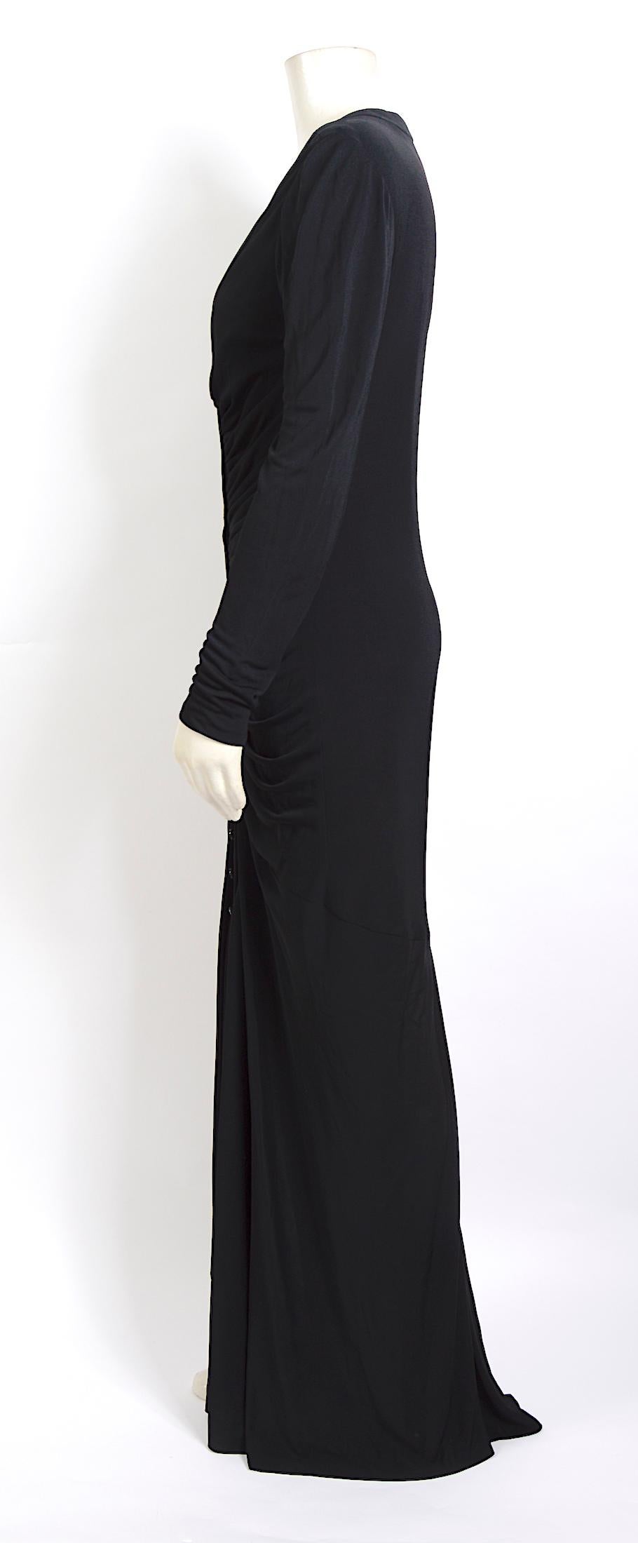 Elegant 1990s draped jersey evening gown by Jacques Fath 
In perfect condition. 
Jersey mix and lined with a soft silk fabric.
We pinned the dress on our doll and there is no size label.
PLEASE use the measurements for the perfect fit. 
Ua to Ua