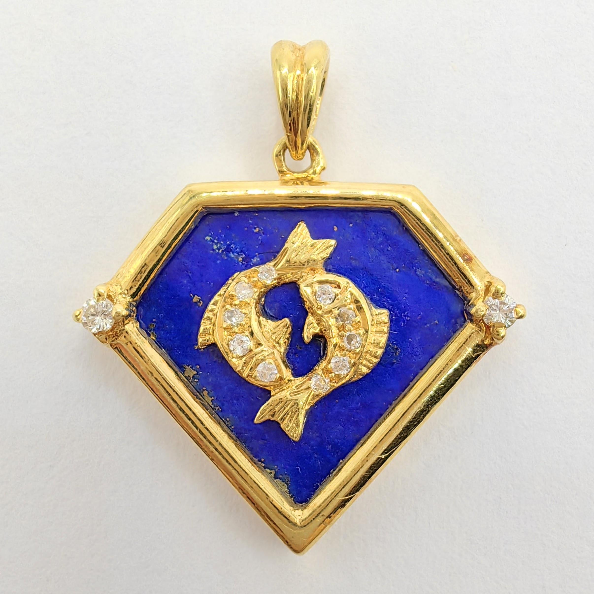 Introducing the Vintage 90's Pisces Blue Lapis Diamond Necklace Pendant in 20K Yellow Gold. This pendant is a true embodiment of celestial beauty and timeless elegance.

At the heart of this pendant lies a beautifully crafted Pisces zodiac motif in