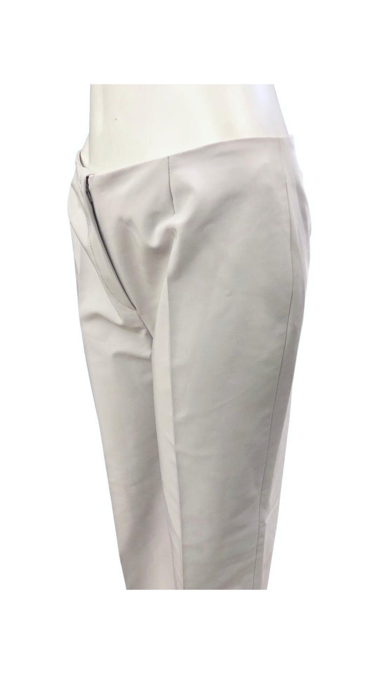 - Vintage 90s Prada white polyester/spandex pants. 

- Zip, press and button closure. 

- 90% Polyester, 10% Spandex

- Size 44. 