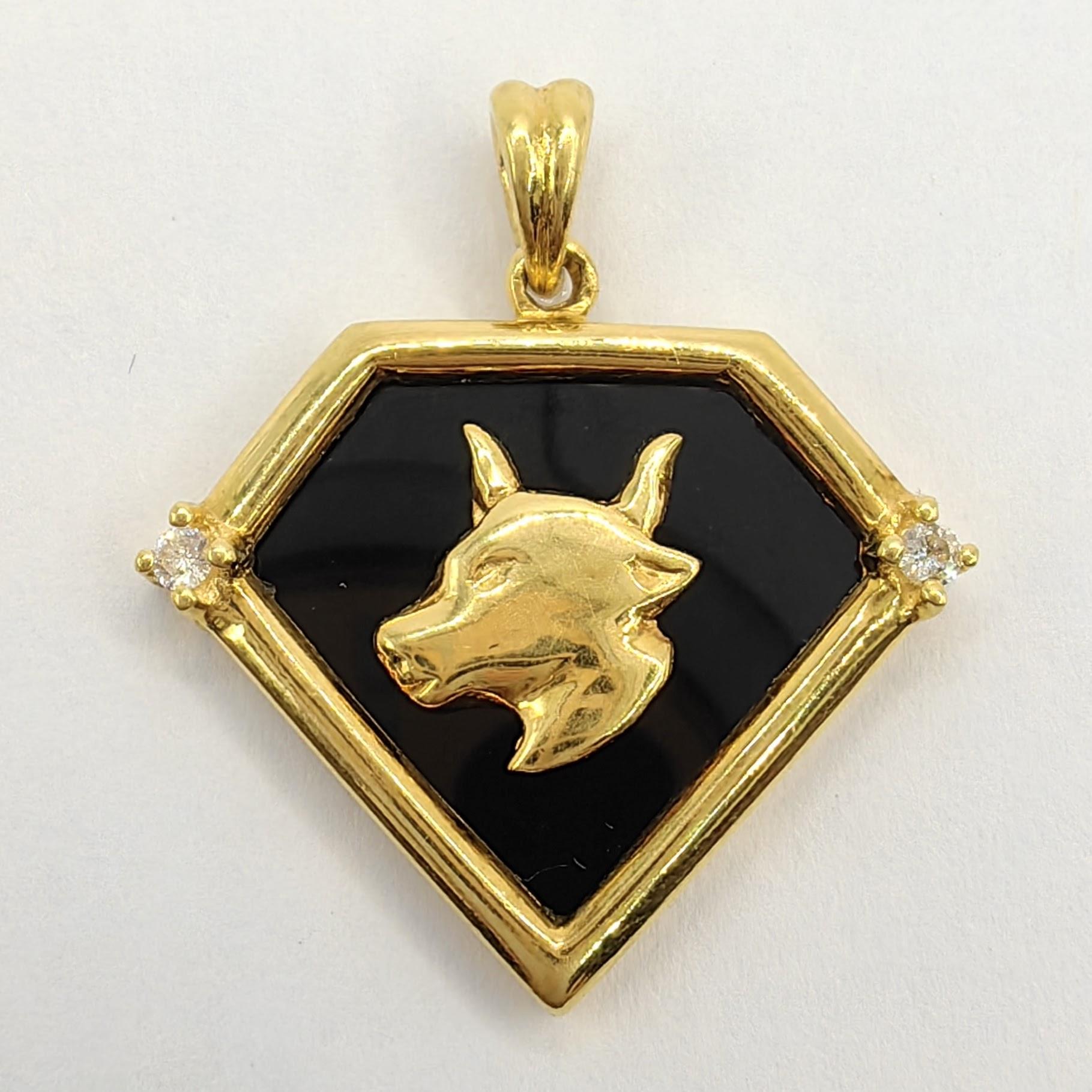 Introducing the Vintage 90's Taurus Onyx Diamond Necklace Pendant in 20K Yellow Gold. This exquisite pendant combines the allure of a diamond-shaped black onyx with the timeless elegance of 20K yellow gold. The onyx is beautifully framed by a gold
