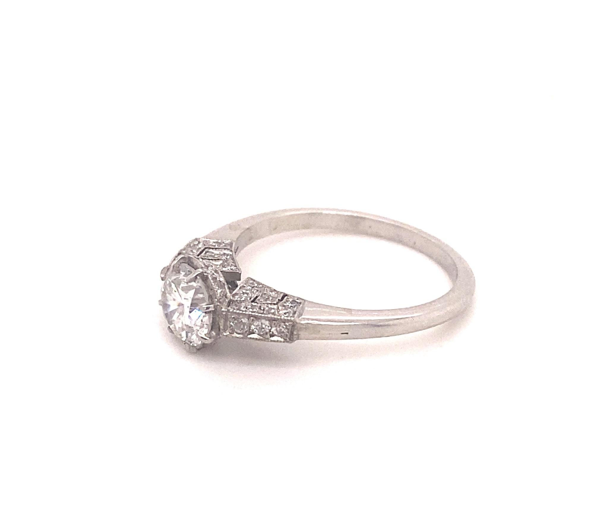 Round Cut Vintage .91 Carat and Pave Diamond Platinum Engagement Ring For Sale