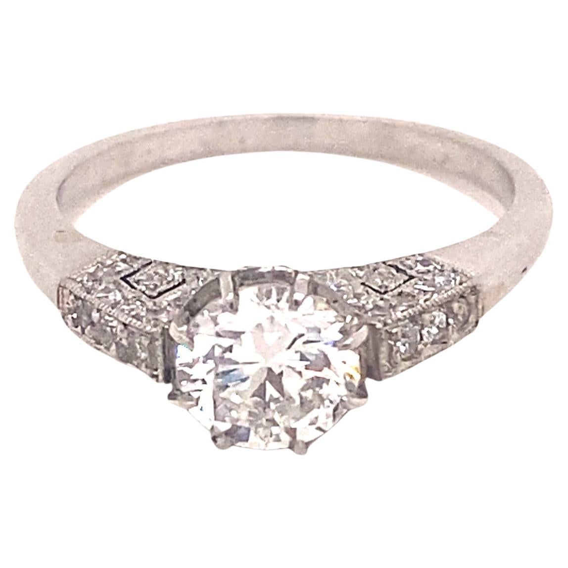 Vintage .91 Carat and Pave Diamond Platinum Engagement Ring For Sale