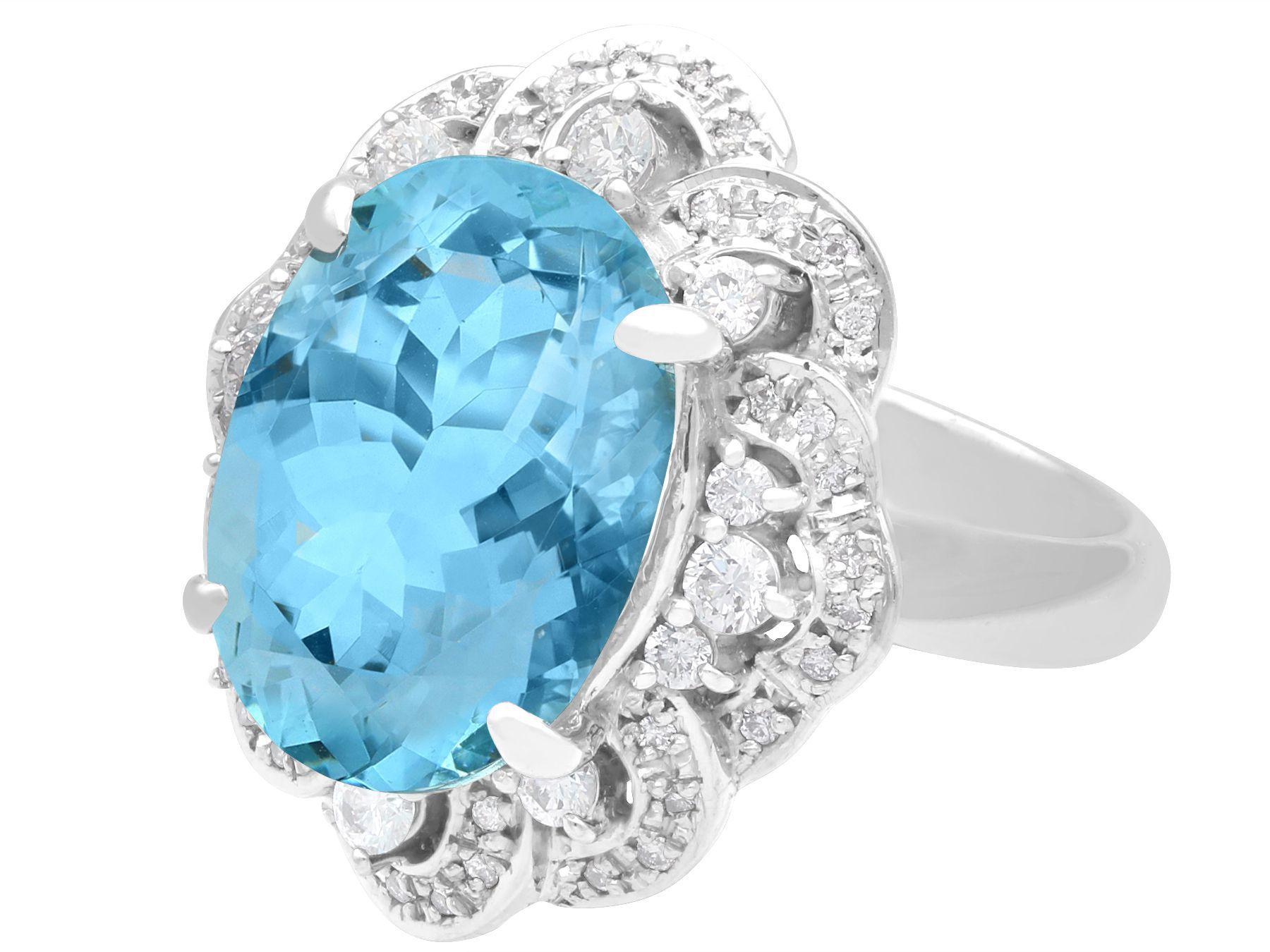 A stunning, fine and impressive 9.26 carat aquamarine and 0.70 carat diamond, 18 karat white gold dress ring; part of our diverse gemstone jewelry and estate jewelry collections.

This stunning, fine and impressive aquamarine ring has been crafted