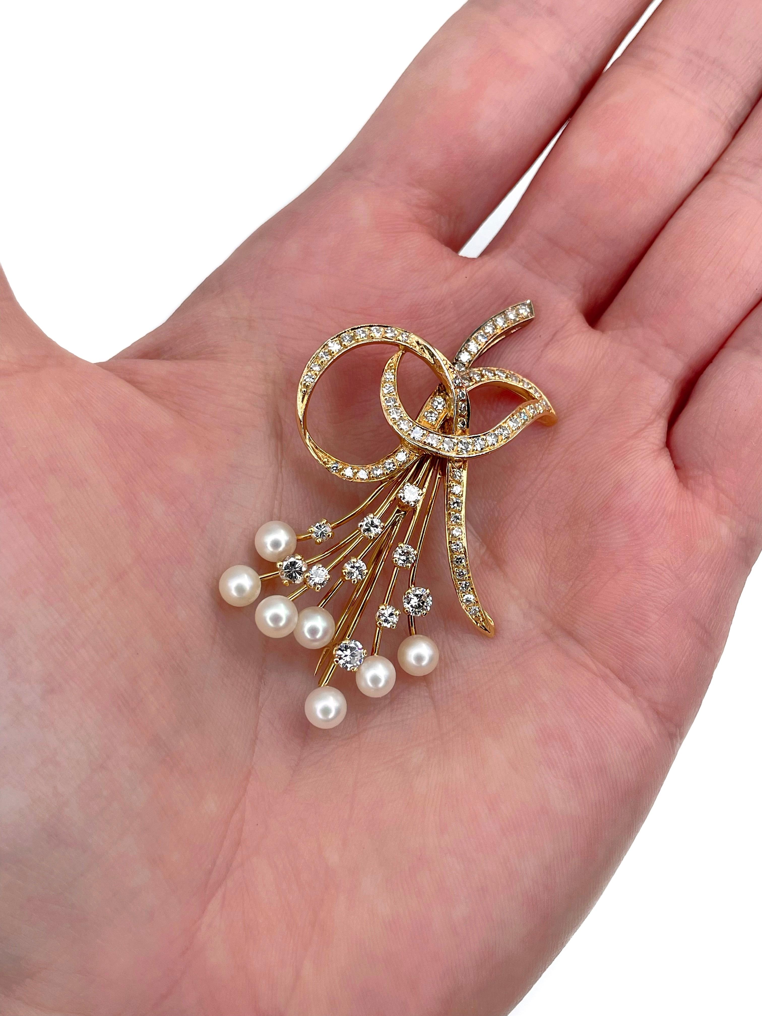 It is a vintage floral motif pin brooch crafted in 950 platinum. Pin and “wires” are made of 18K gold. Circa 1960. 

The piece features:
- 7 cultured pearls
- 56 diamonds, RBC-17, TW 0.40ct, RW+/W, VS
- 10 diamonds, round brilliant cut, TW 0.60ct,