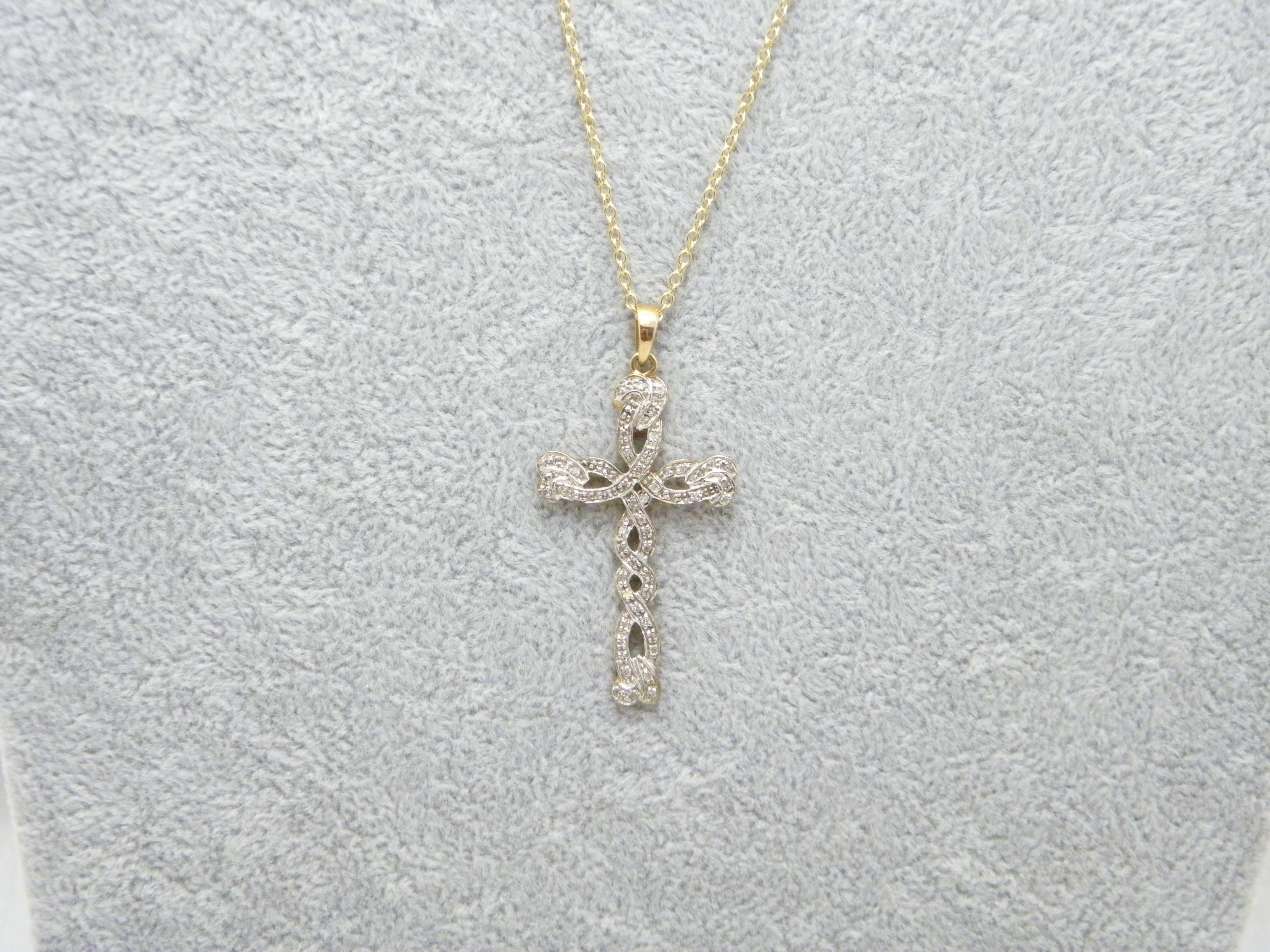 If you have landed on this page then you have an eye for beauty.

On offer is this gorgeous

9CT GOLD DIAMOND CELTIC CROSS / CRUCIFIX PENDANT NECKLACE

PENDANT DESCRIPTION
DETAILS
Material: Solid 9ct (375/000) yellow gold
Style: Gem encrusted Large