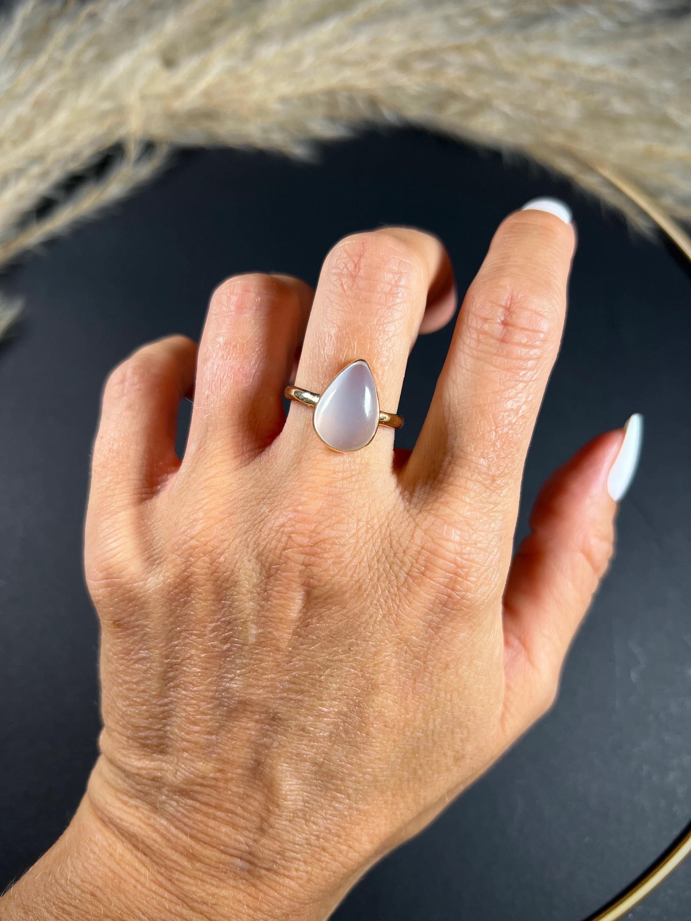 Vintage Moonstone Ring

9ct Gold Tested 

Circa 1940’s 

This stunning tear drop shaped moonstone ring is a true vintage beauty. Made in the 1940s, it features a genuine, high-quality, natural moonstone set in 9ct gold with a 2.3mm tapered band.