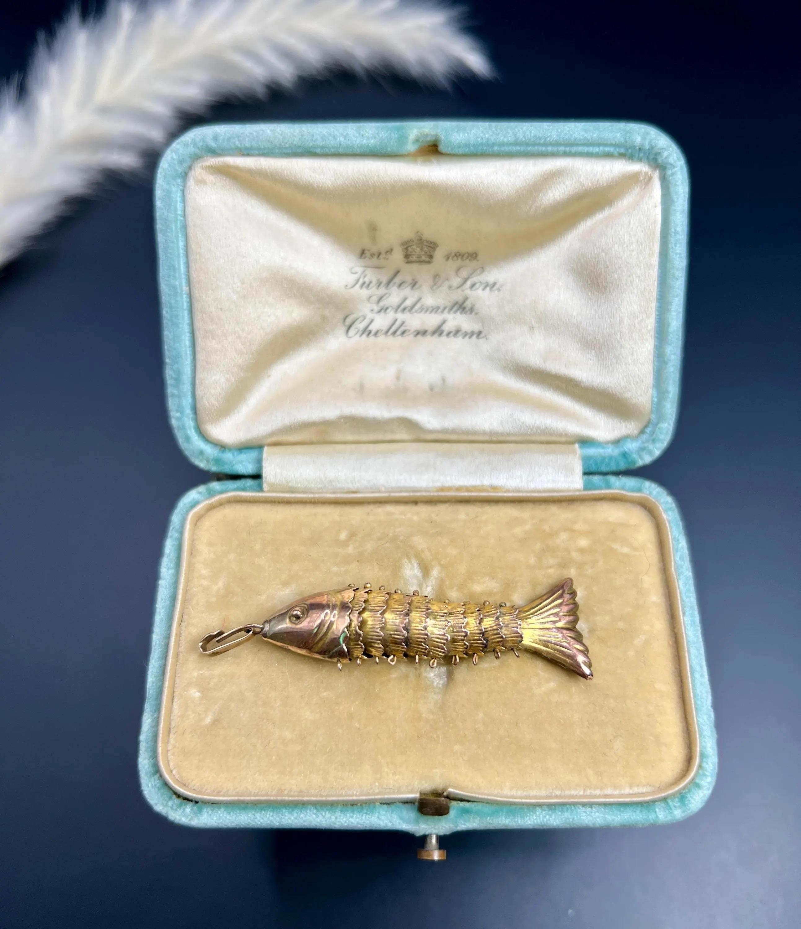 Lucky Fish Pendant

9ct Gold Tested

Circa 1970s

*THE CHAIN IS SOLD SEPARATELY 

Dive into elegance with our stunning vintage 9ct gold lucky fish pendant, a striking piece that embodies timeless charm. This large pendant showcases a beautifully