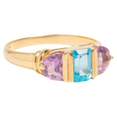 Anillo vintage de tres piedras de oro de 9 ct con amatista y topacio