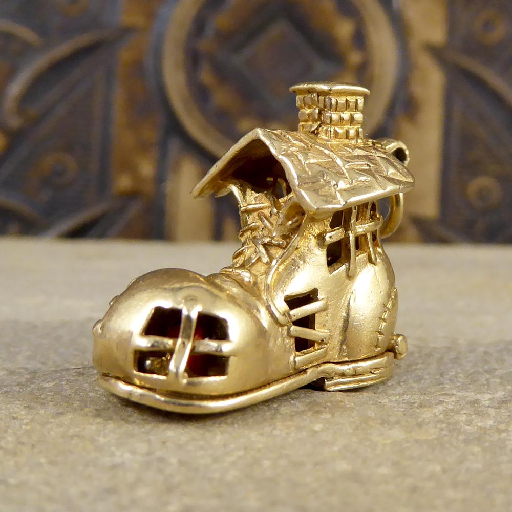 This Vintage Boot Charm is beautifully crafted in 9ct Gold and opens to reveal an old woman and her children! The perfect gift, and can be worn on a charm bracelet or as a pendant on a chain (link for 9ct Gold chain). 

'There was an old woman who