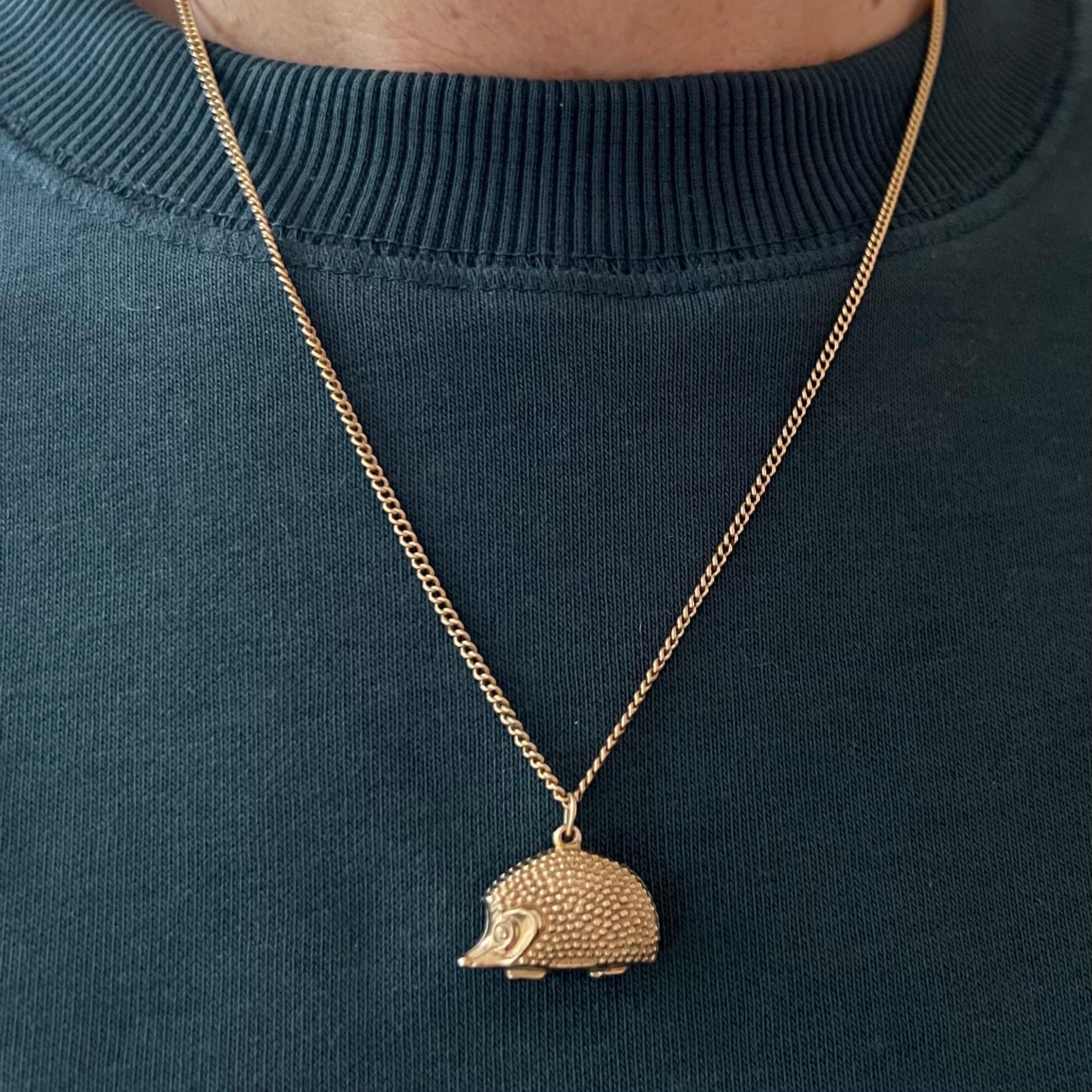 An adorable vintage 9 karat yellow gold hedgehog charm pendant. This hedgehog is beautifully detailed with its lovely sweet face and the granulated spines. 

In the spiritual realm, the hedgehog spirit animal symbolizes the importance of