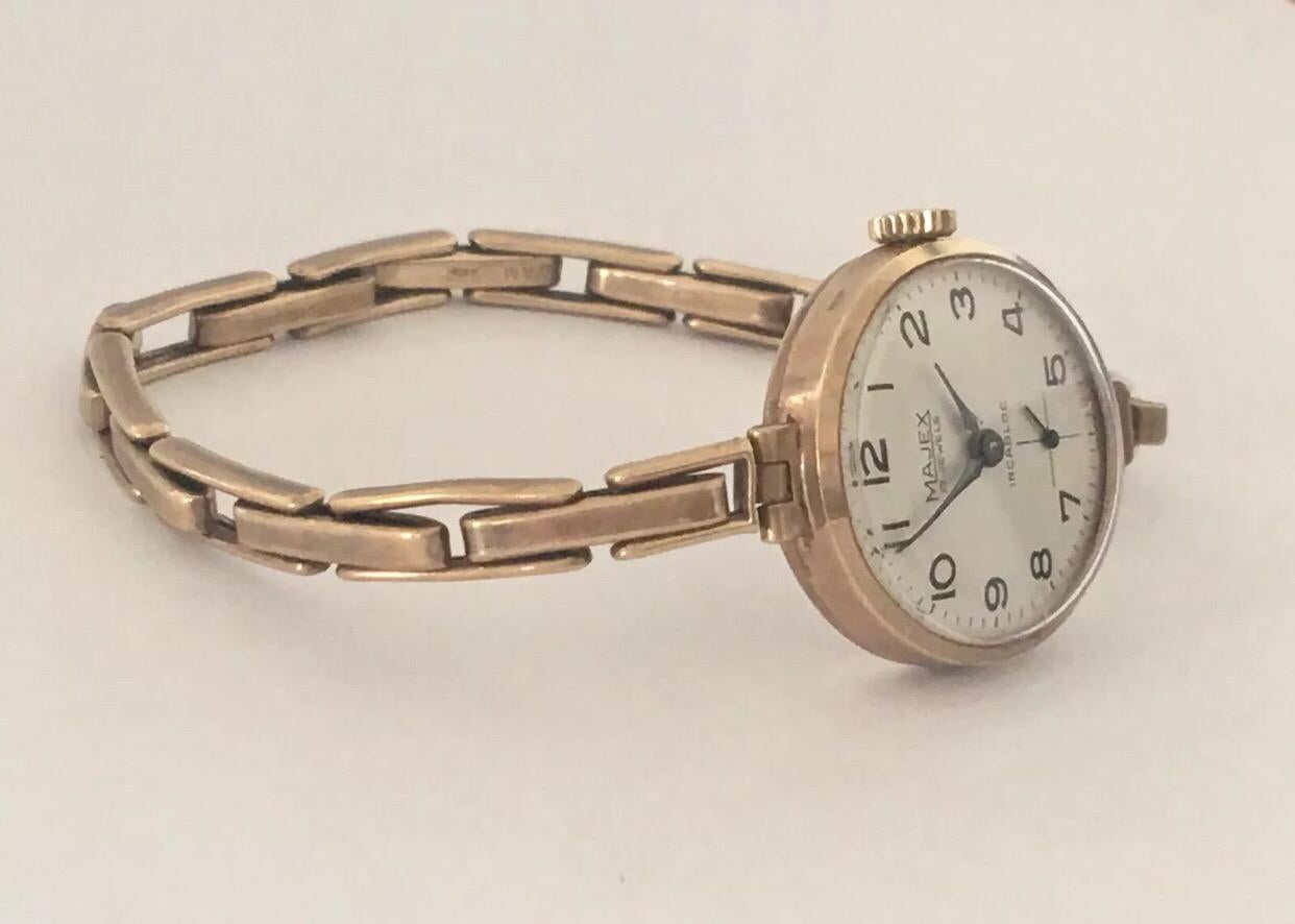 majex ladies gold watch