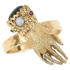 Vintage 9 Carat Gold Opal, Garnet, Ruby and Diamond Hand Ring, circa 1973