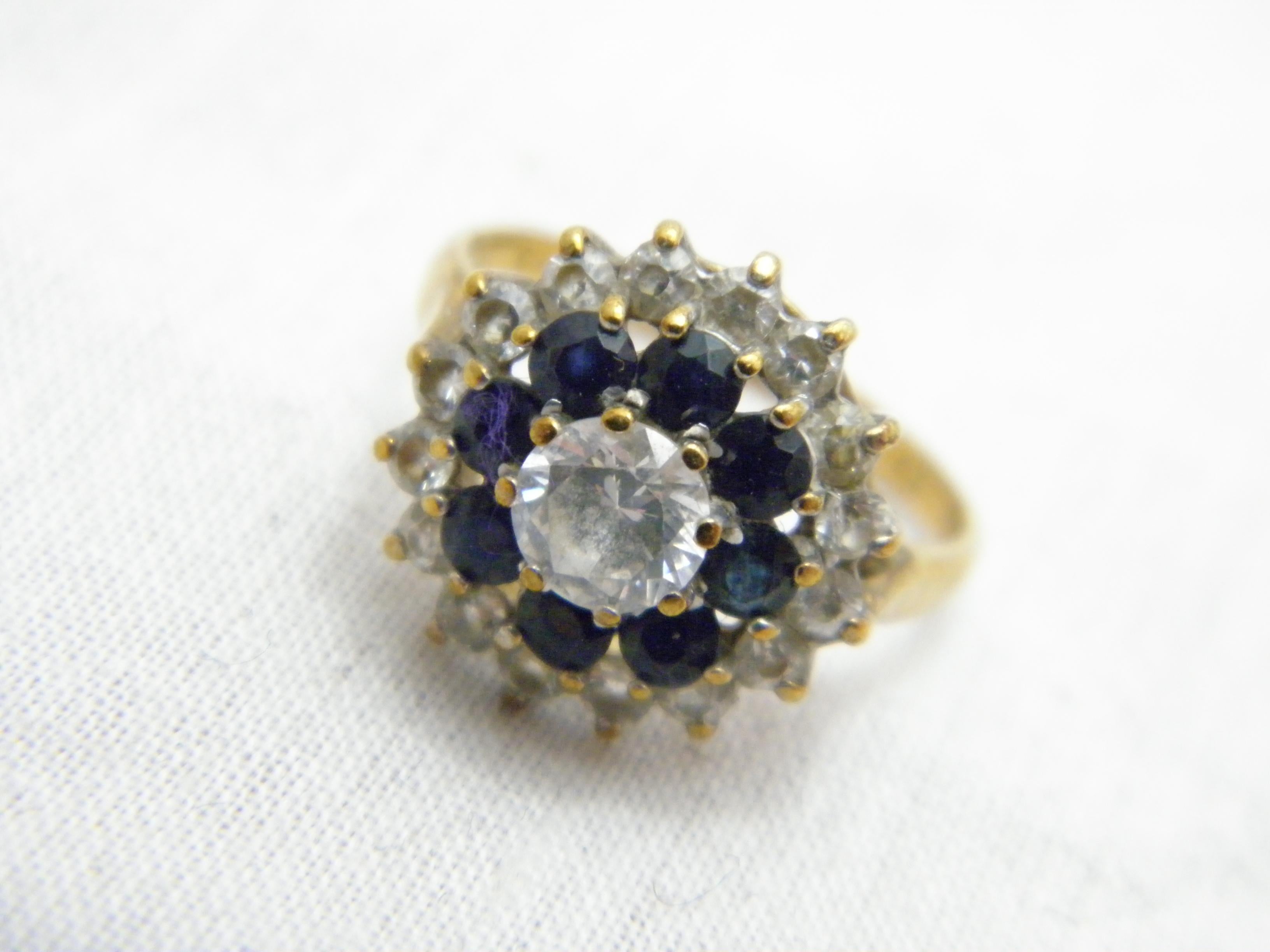 If you have landed on this page then you have an eye for beauty.

On offer is this gorgeous

9CT GOLD SAPPHIRE AND DIAMOND PASTE CLUSTER COCKTAIL RING

DETAILS
Material: 9ct 375/000 Yellow Gold
This ring has a sturdy shank hence ideal if resizing